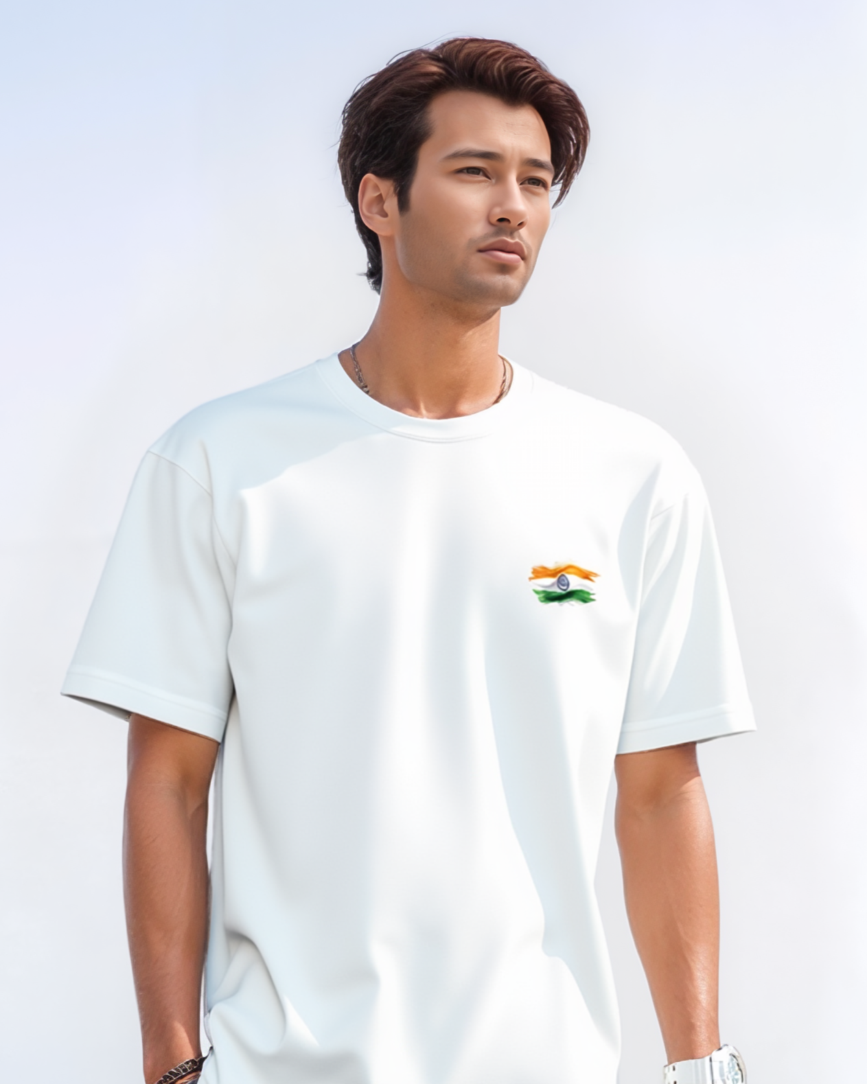 Man wearing a white t-shirt with a small logo on a light gray background