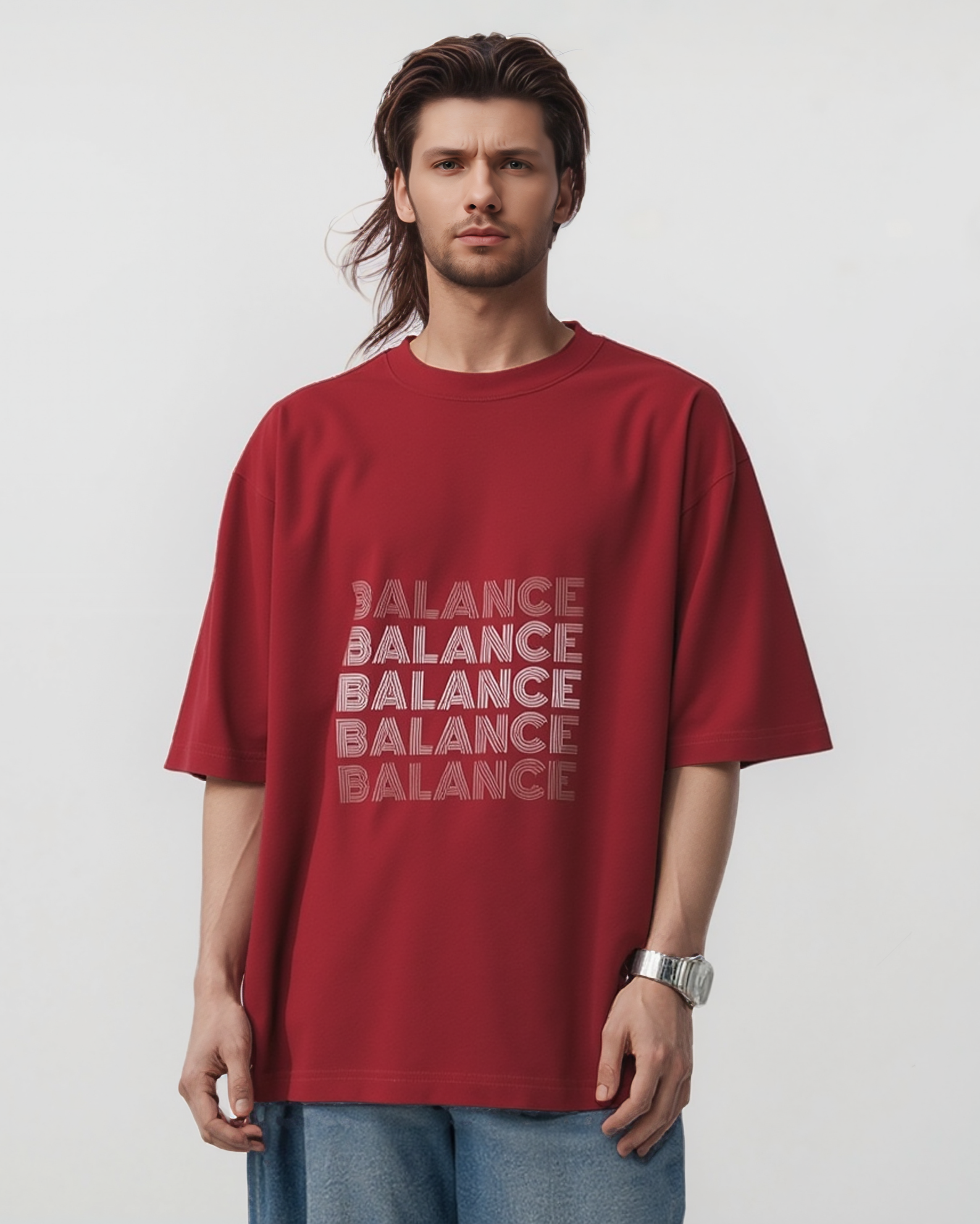 Person wearing a red t-shirt with 'BALANCE' text on a plain background